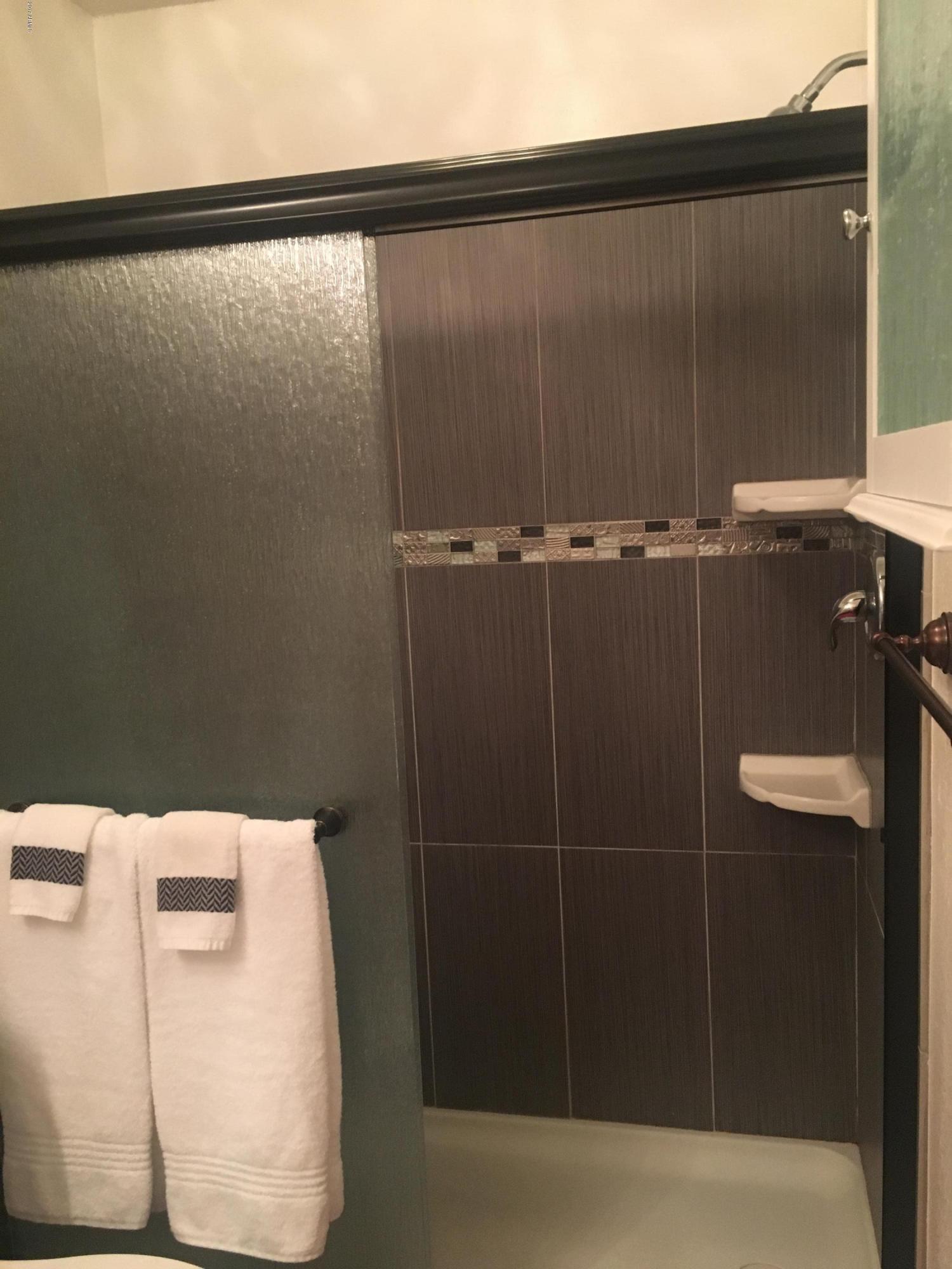 14300 West Bell Road, Unit 77 Surprise, AZ 85374 - Photo 18 of 22 Tile Step In Shower
