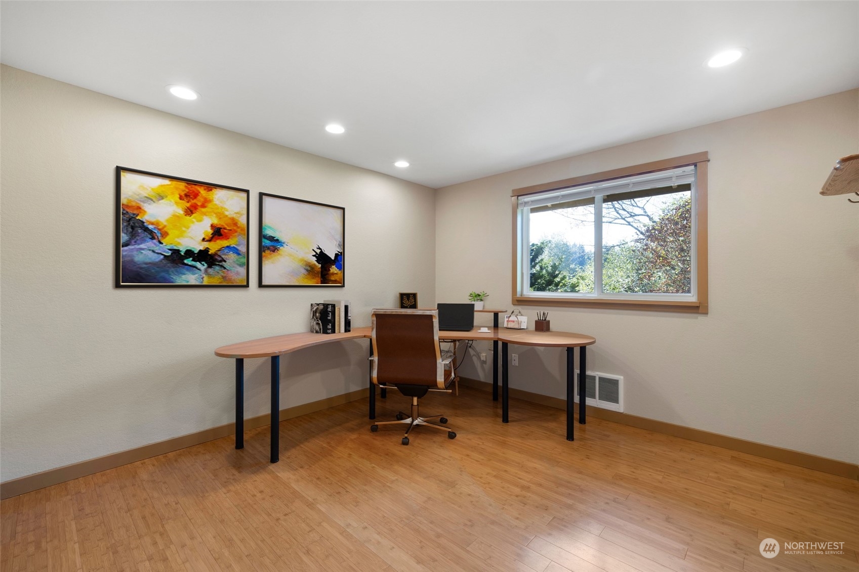 1506 227th Place Southwest Bothell, WA 98021 - Photo 18 of 25 a view of a workspace with furniture and a window