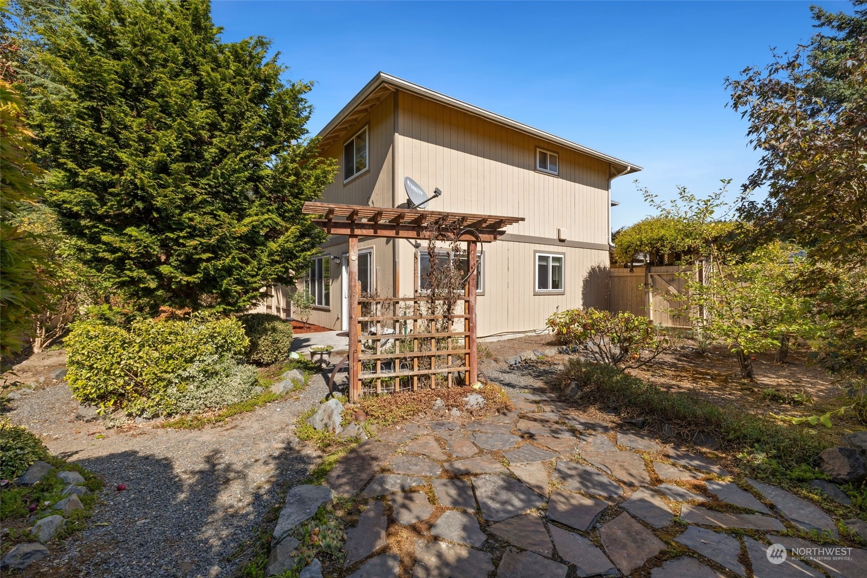 1506 227th Place Southwest Bothell, WA 98021 - Photo 23 of 25 a front view of a house with a yard