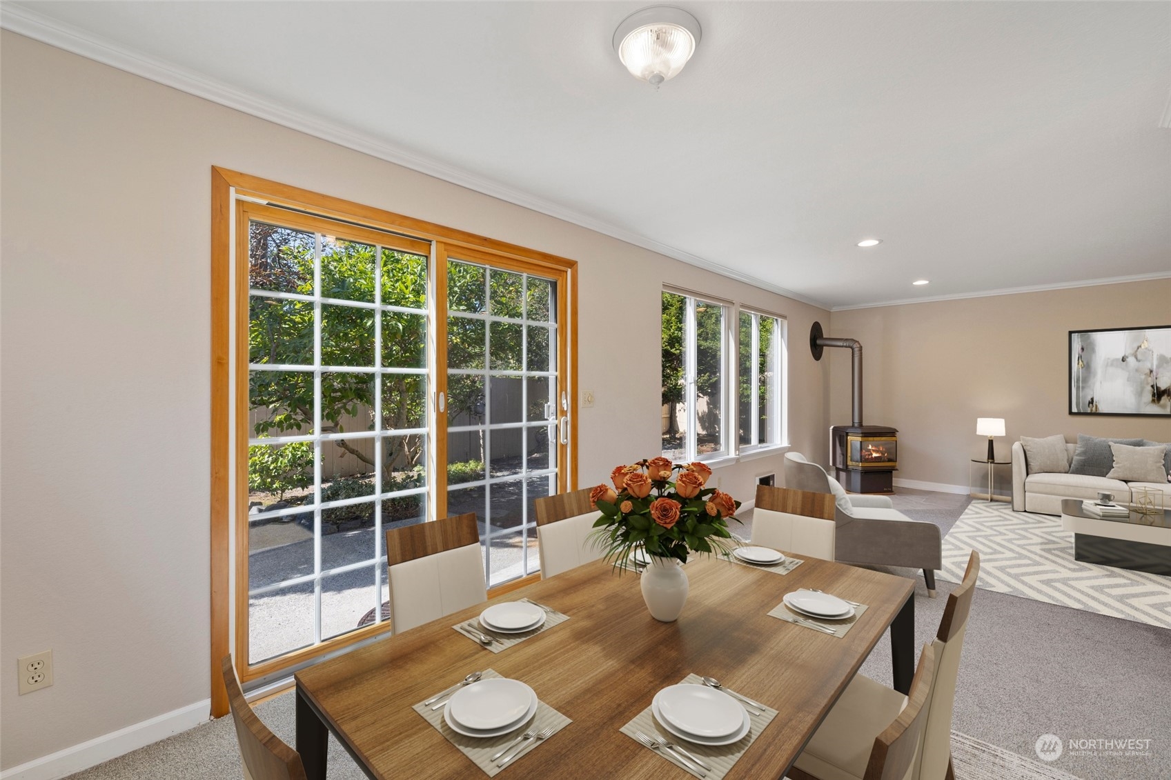1506 227th Place Southwest Bothell, WA 98021 - Photo 9 of 25 a view of a dining room with furniture window and wooden floor