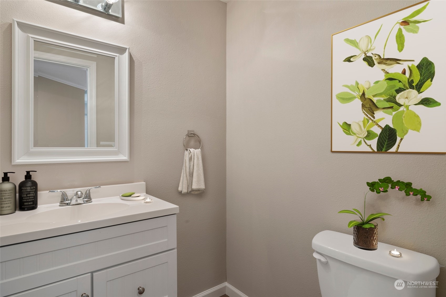 1506 227th Place Southwest Bothell, WA 98021 - Photo 10 of 25 a bathroom with a toilet sink and mirror