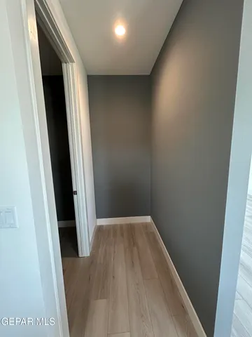 a view of entryway with wooden floor