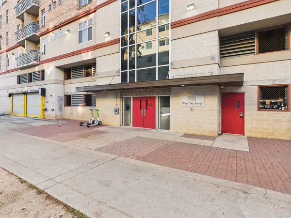 a view of parking with an entrance
