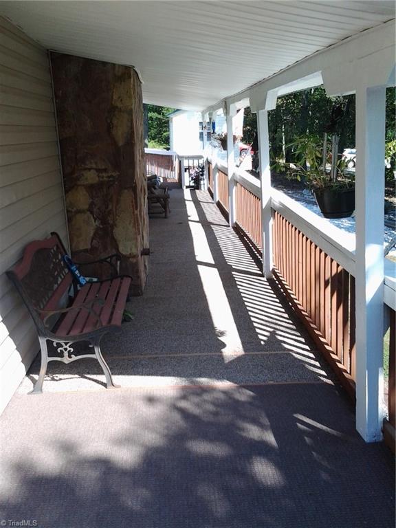1693 Sauratown Road King, NC 27021 - Photo 6 of 18 Extra long front porch overlooking mountain views.
