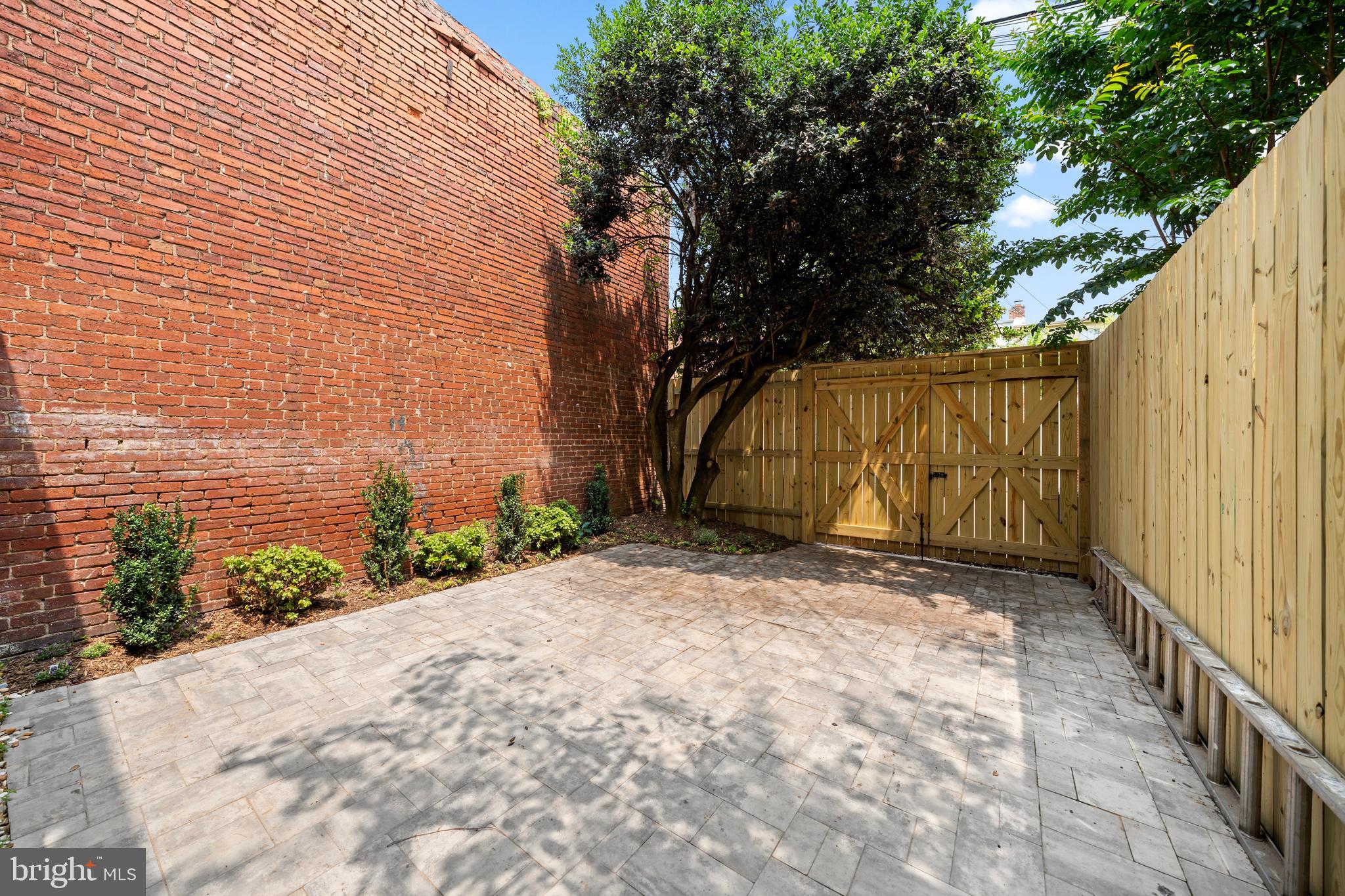 131 11th Street Northeast, Unit 3 Washington, DC 20002 - Photo 35 of 57 Rear parking and Patio