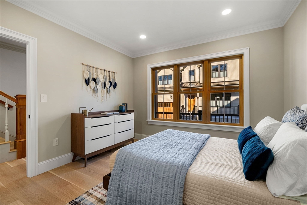 7 Flatley Avenue Manchester, MA 01944 - Photo 18 of 42 a bed room with a bed and a window