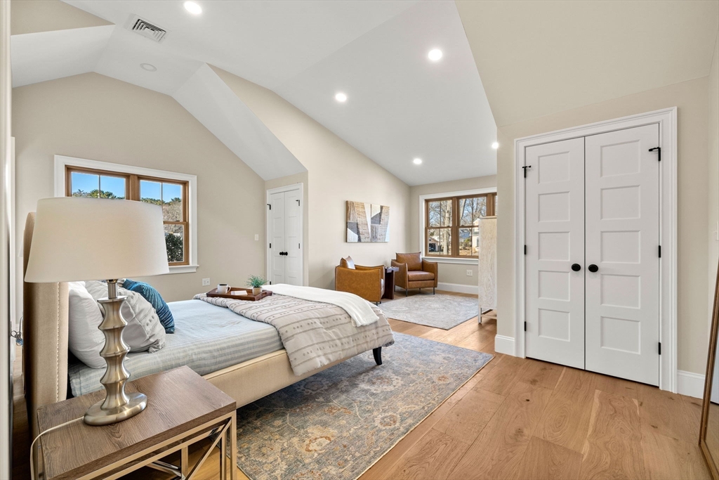 7 Flatley Avenue Manchester, MA 01944 - Photo 24 of 42 a spacious bedroom with a bed and furniture