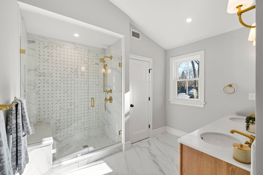 7 Flatley Avenue Manchester, MA 01944 - Photo 25 of 42 a bathroom with a sink a toilet and shower