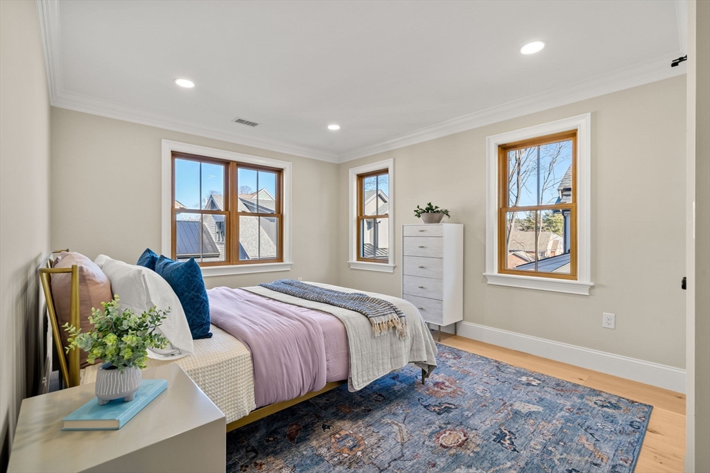 7 Flatley Avenue Manchester, MA 01944 - Photo 32 of 42 a bedroom with bed and a window