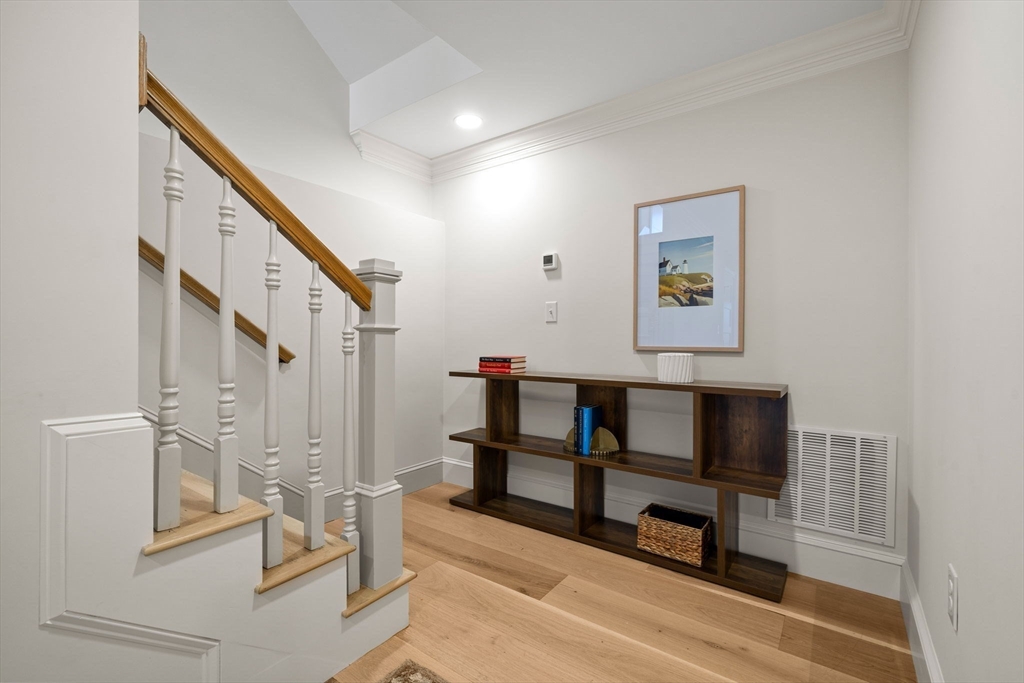 7 Flatley Avenue Manchester, MA 01944 - Photo 34 of 42 a view of entryway with stairs and furniture