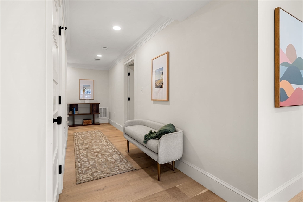 7 Flatley Avenue Manchester, MA 01944 - Photo 35 of 42 a living room with furniture and a table