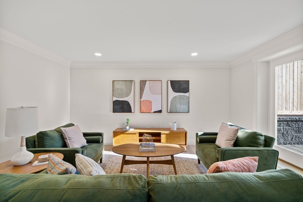 7 Flatley Avenue Manchester, MA 01944 - Photo 39 of 42 a living room with furniture and window