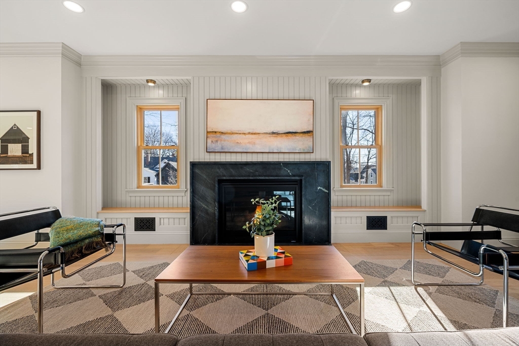 7 Flatley Avenue Manchester, MA 01944 - Photo 4 of 42 a living room with furniture a fireplace and window