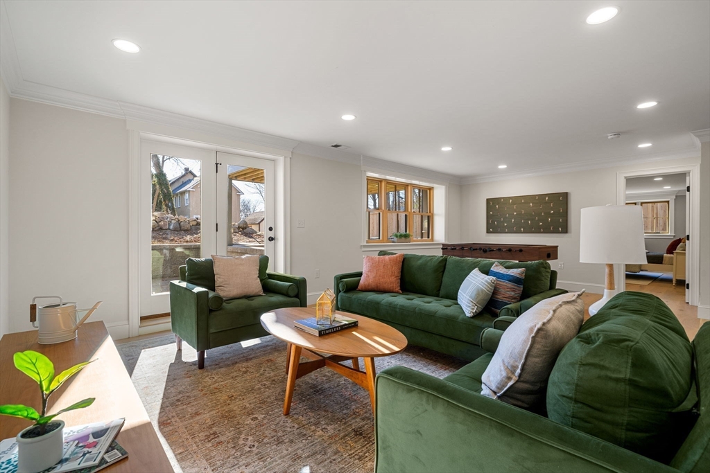 7 Flatley Avenue Manchester, MA 01944 - Photo 41 of 42 a living room with furniture and wooden floor