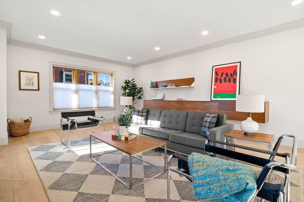 7 Flatley Avenue Manchester, MA 01944 - Photo 7 of 42 a living room with furniture and a rug