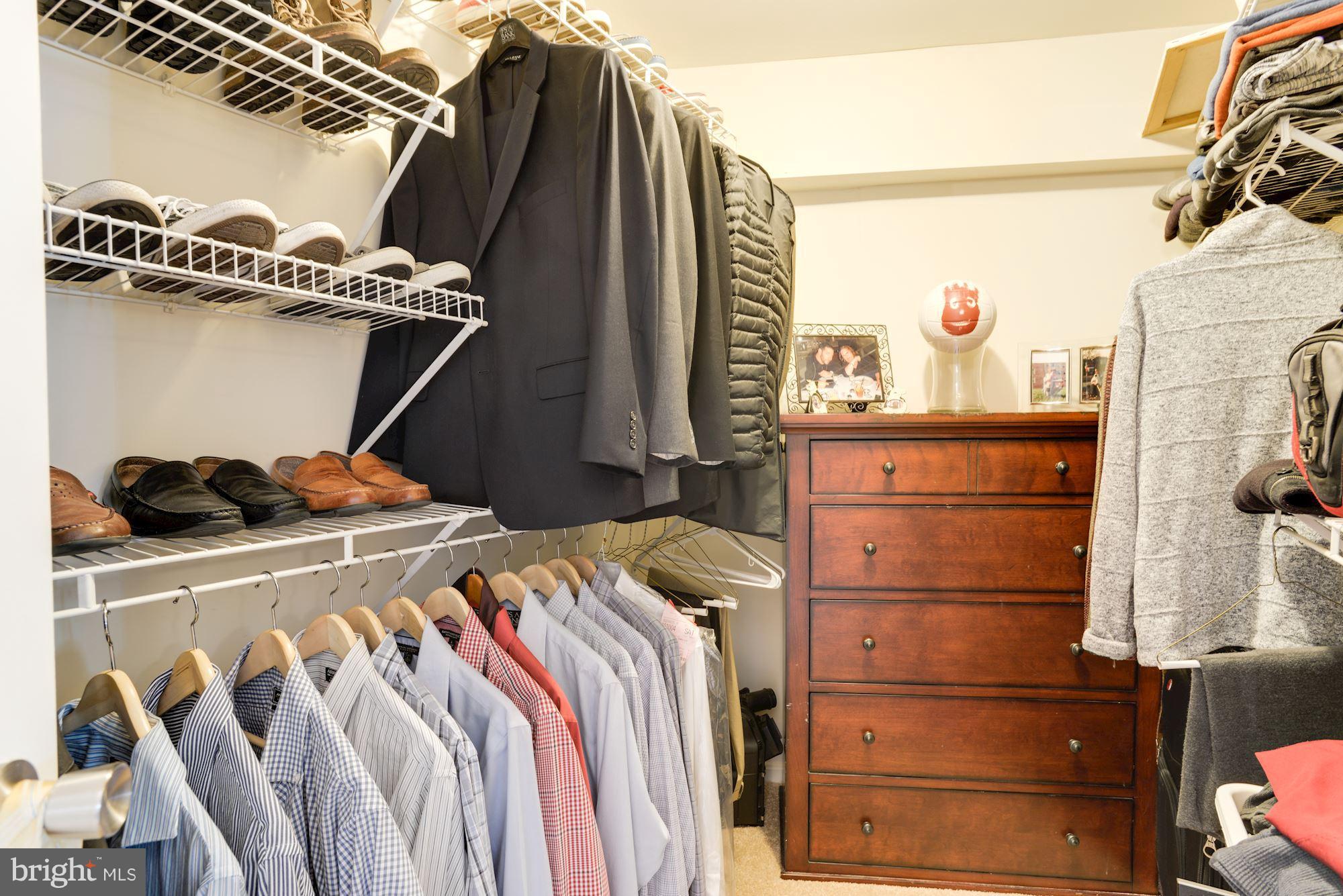 1704 Quietree Drive Reston, VA 20194 - Photo 17 of 23 a bedroom with a bed and a closet