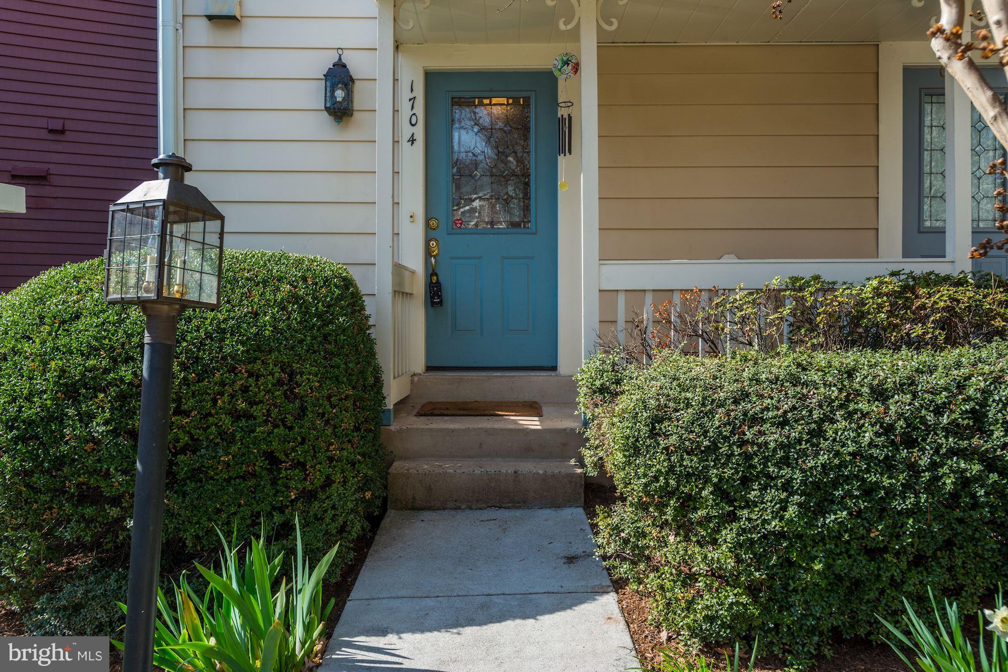 1704 Quietree Drive Reston, VA 20194 - Photo 3 of 23 a house with a garden space