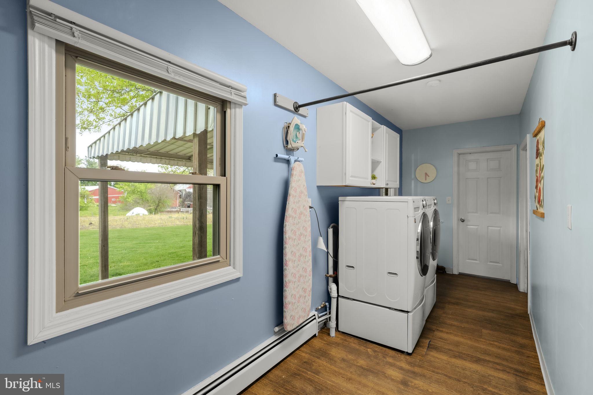 1160 Narvon Road Narvon, PA 17555 - Photo 48 of 64 a utility room with wooden floor washer and dryer