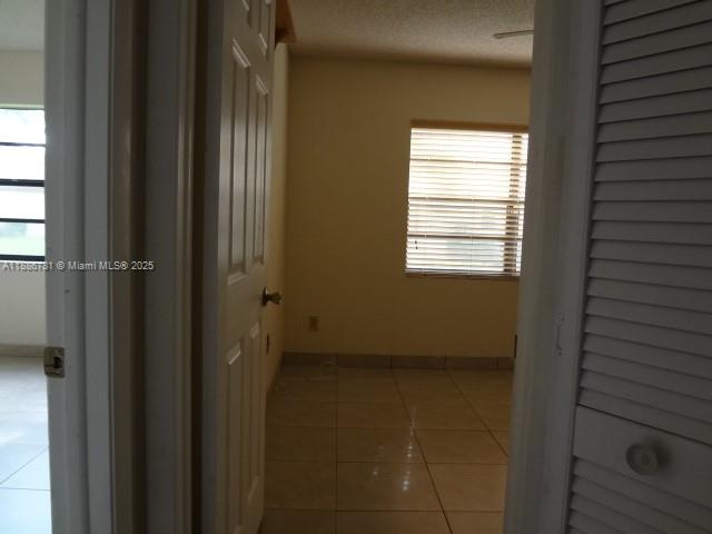 18216 Mediterranean Boulevard, Unit 119 Hialeah, FL 33015 - Photo 14 of 42 a view of a bathroom