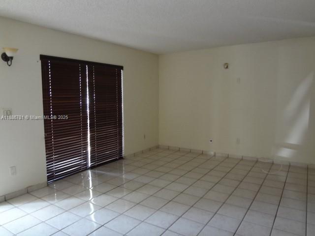 18216 Mediterranean Boulevard, Unit 119 Hialeah, FL 33015 - Photo 16 of 42 a view of an empty room