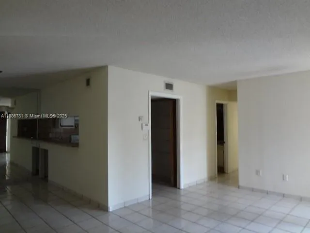 a kitchen with a stove and a sink