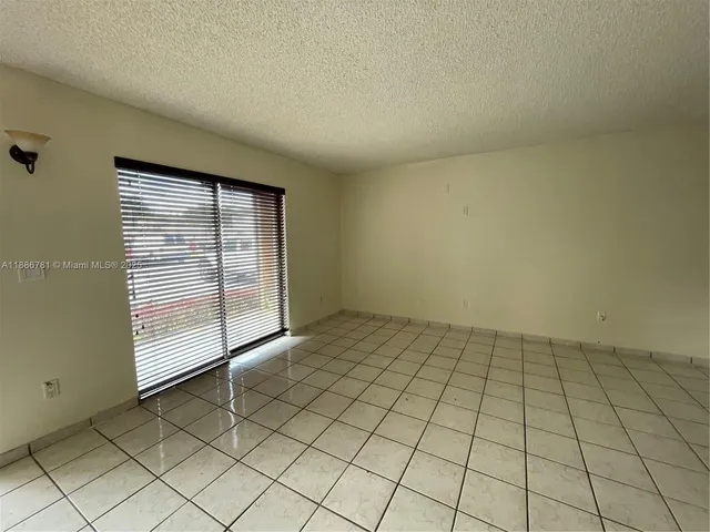 a view of swimming pool with a couch