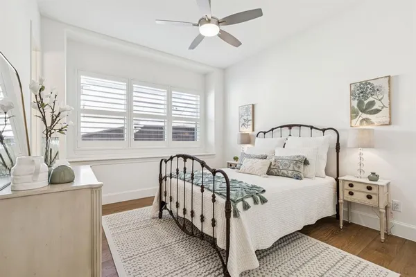 a room with furniture or wooden floor and a chandelier
