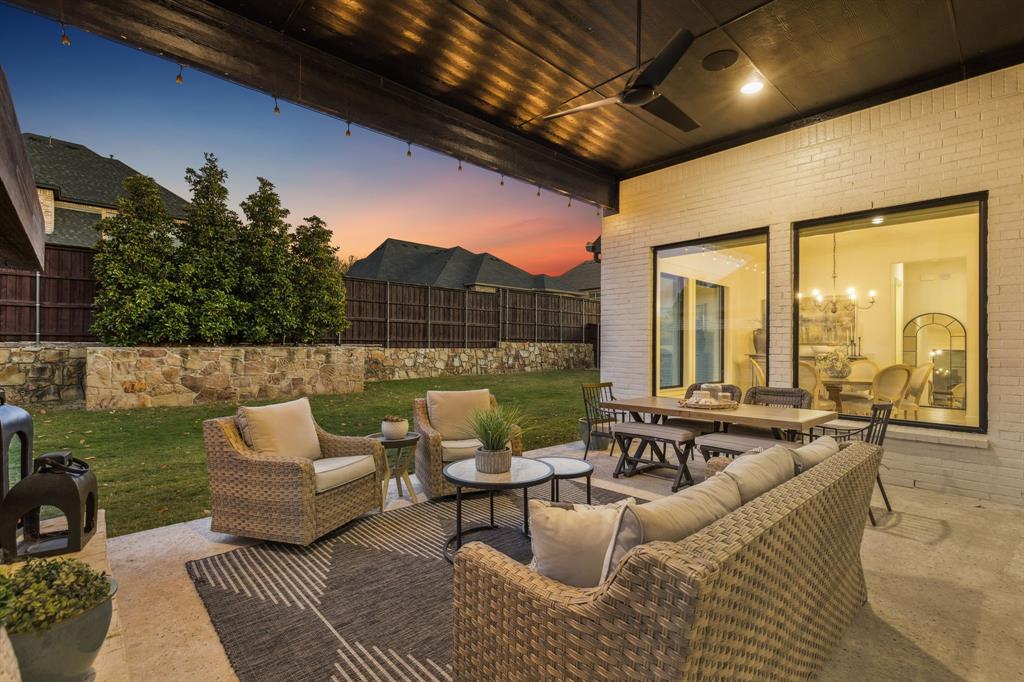 1000 Cir J Trail Prosper, TX 75078 - Photo 37 of 38 a outdoor living space with patio furniture and a potted plant