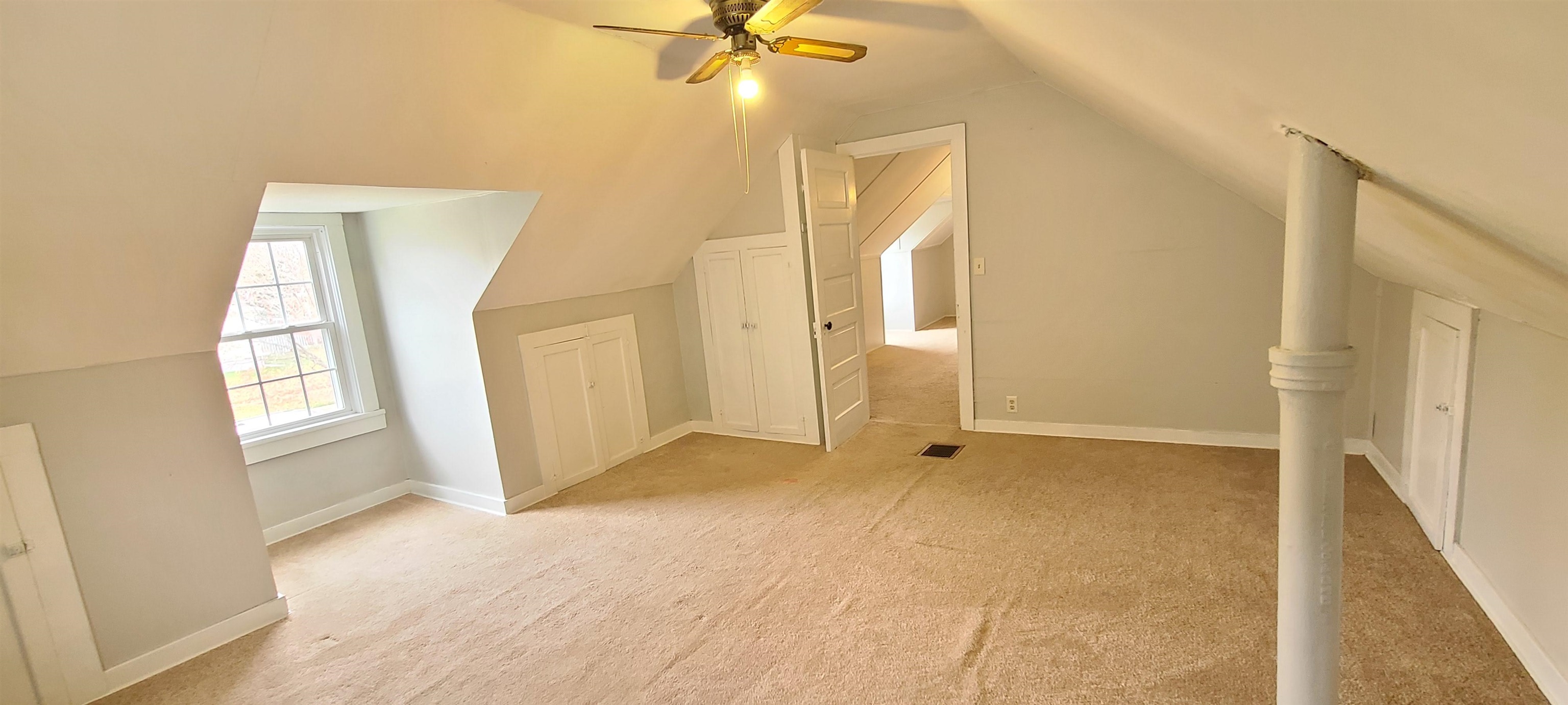 312 North 12th Street Rochelle, IL 61068 - Photo 13 of 25 an empty room with windows and closet