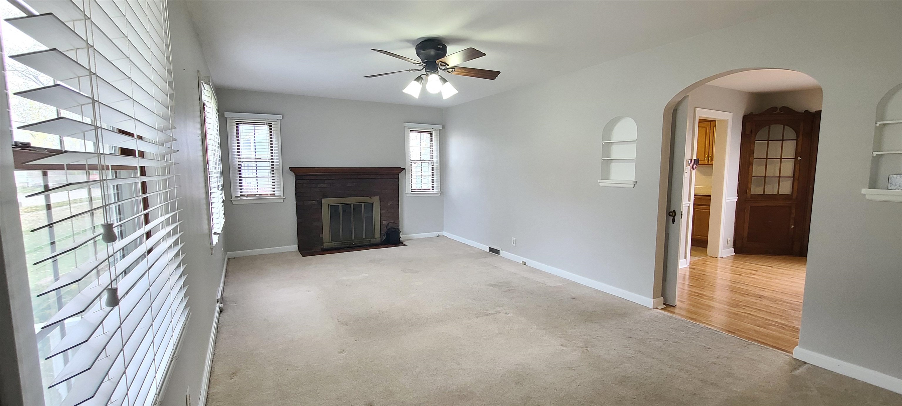 312 North 12th Street Rochelle, IL 61068 - Photo 6 of 25 a view of an empty room with a kitchen