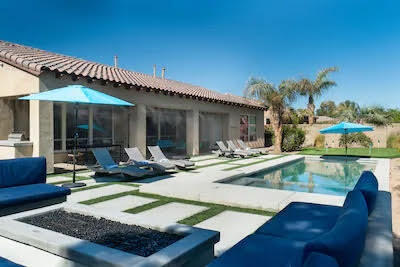 48640 Cascade Street Indio, CA 92201 - Photo 13 of 49 a view of a house and swimming pool with a sitting space