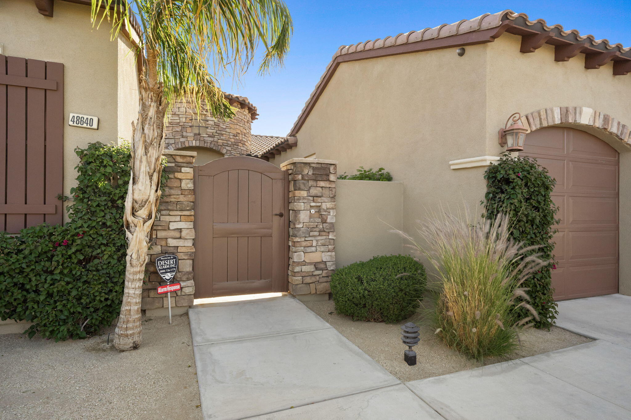 48640 Cascade Street Indio, CA 92201 - Photo 19 of 49 a view of a house with a yard