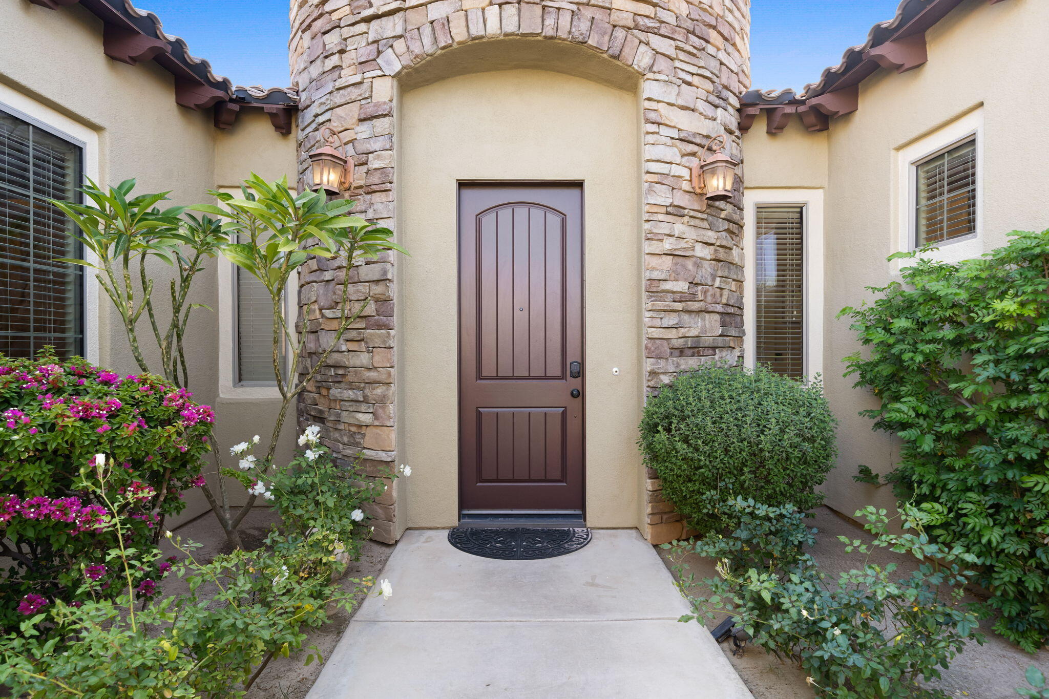 48640 Cascade Street Indio, CA 92201 - Photo 20 of 49 a couple of potted plants in front of door