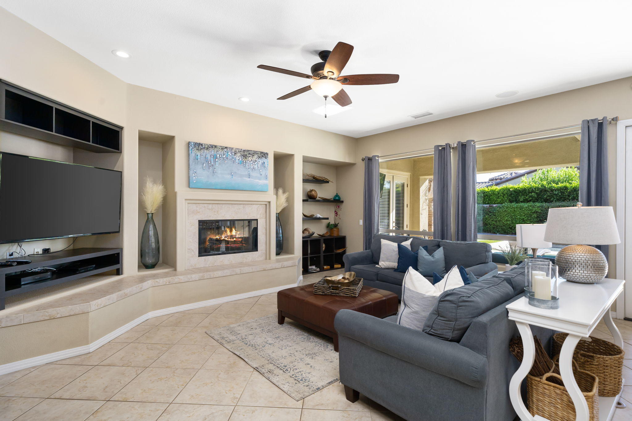 48640 Cascade Street Indio, CA 92201 - Photo 21 of 49 a living room with furniture and a flat screen tv