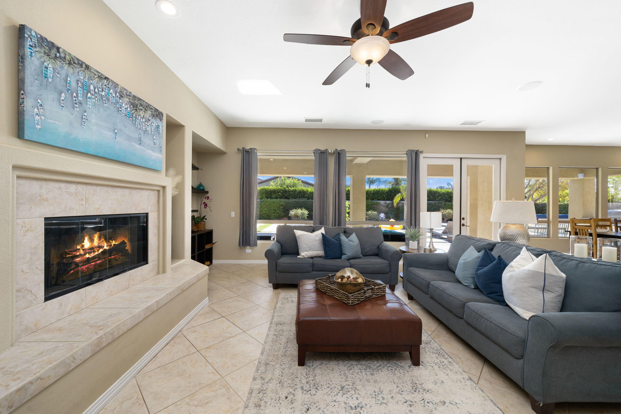 48640 Cascade Street Indio, CA 92201 - Photo 22 of 49 a living room with furniture and a fireplace