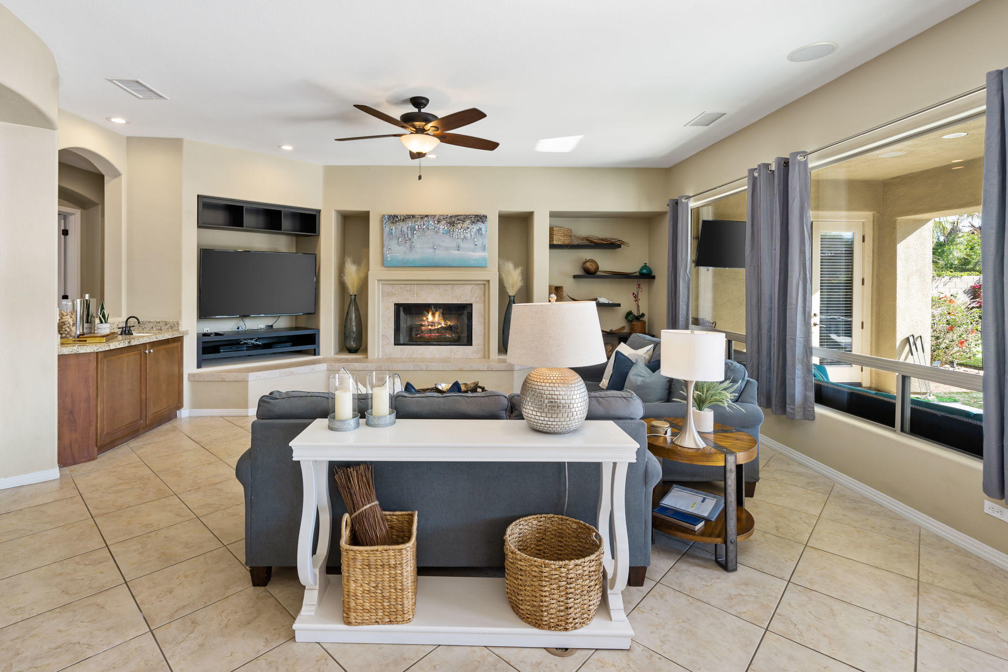 48640 Cascade Street Indio, CA 92201 - Photo 23 of 49 a dining room with granite countertop a table and chairs