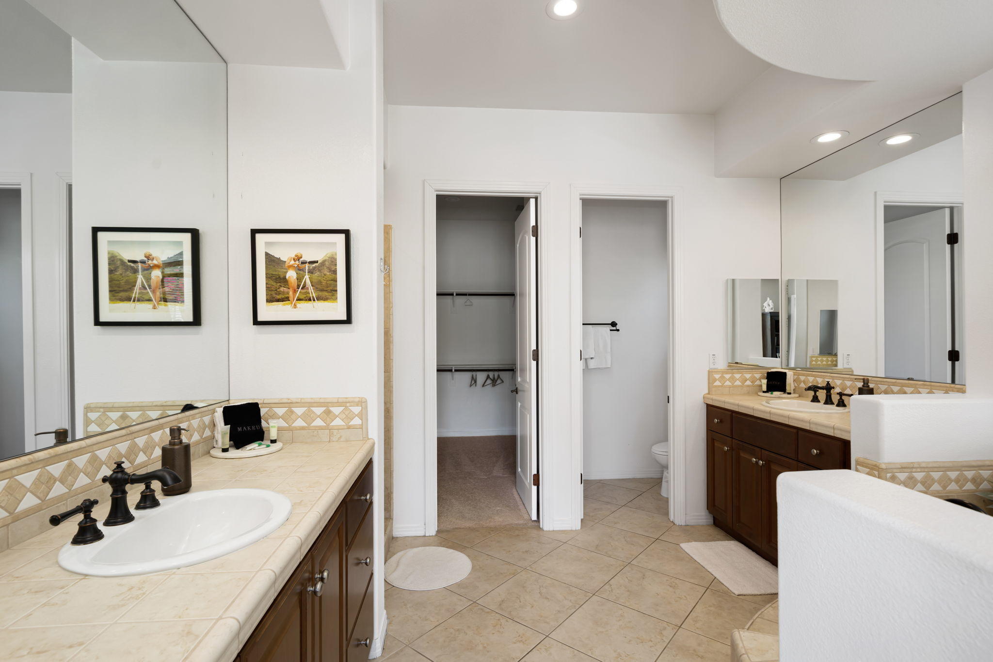 48640 Cascade Street Indio, CA 92201 - Photo 37 of 49 a bathroom with a sink double vanity and a mirror