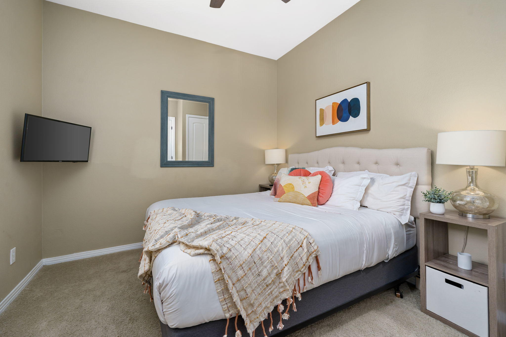 48640 Cascade Street Indio, CA 92201 - Photo 40 of 49 a bedroom with a bed and a flat screen tv