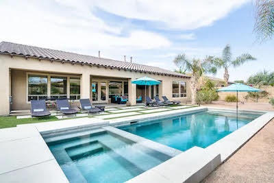 48640 Cascade Street Indio, CA 92201 - Photo 5 of 49 a view of a swimming pool and lounge chair