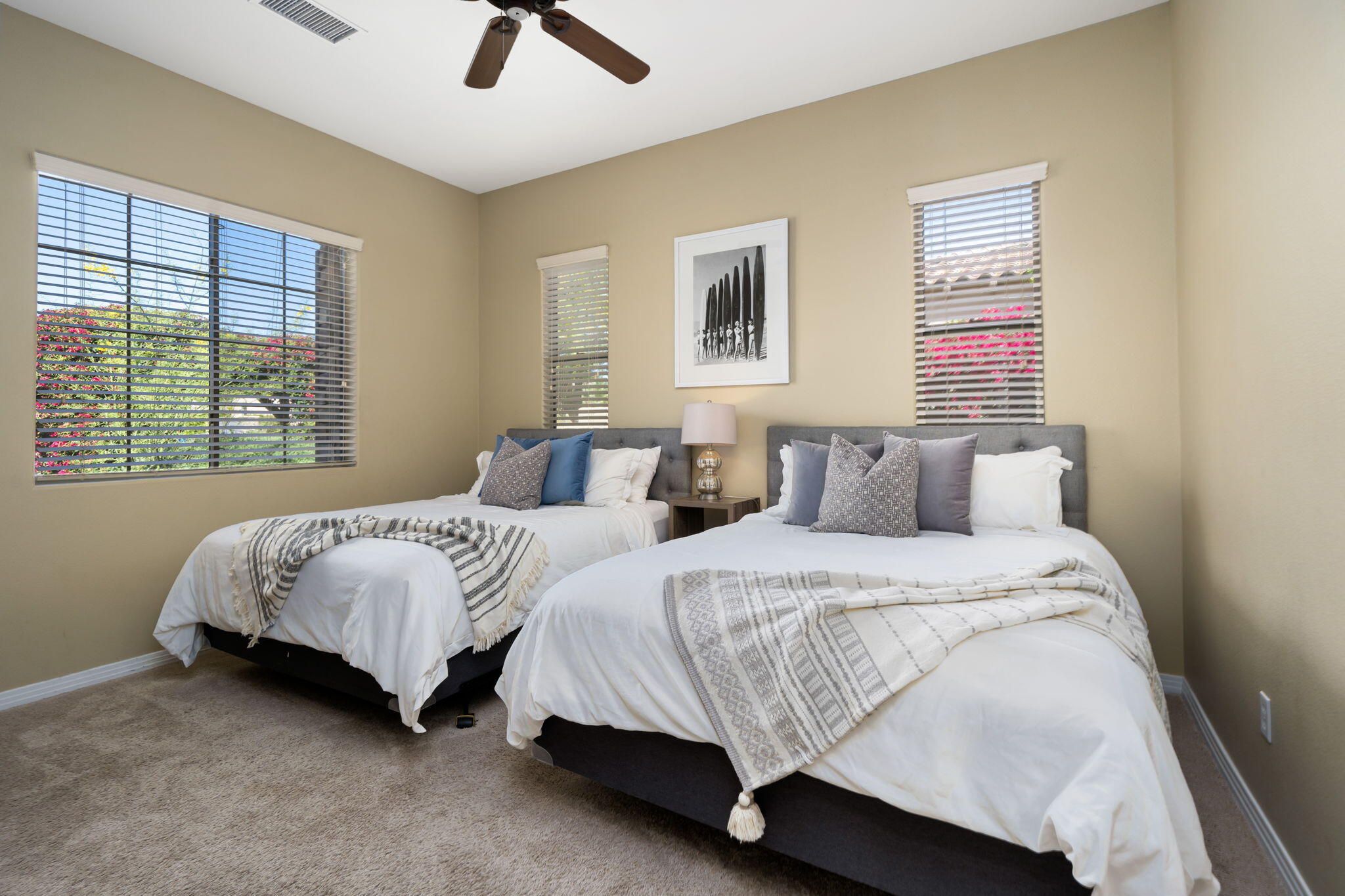 48640 Cascade Street Indio, CA 92201 - Photo 43 of 49 a bedroom with two beds and a window