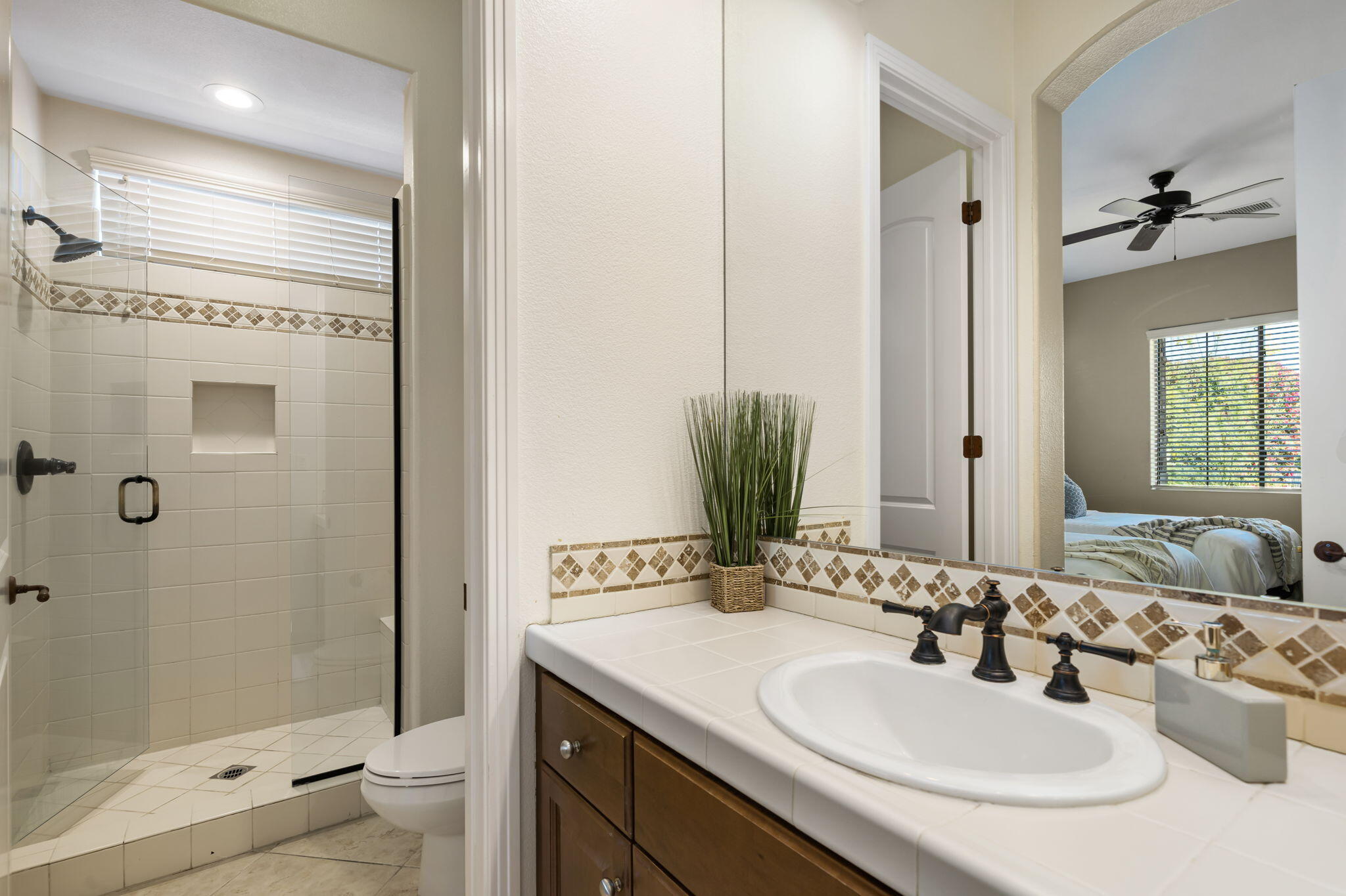 48640 Cascade Street Indio, CA 92201 - Photo 44 of 49 a bathroom with a granite countertop sink toilet and shower