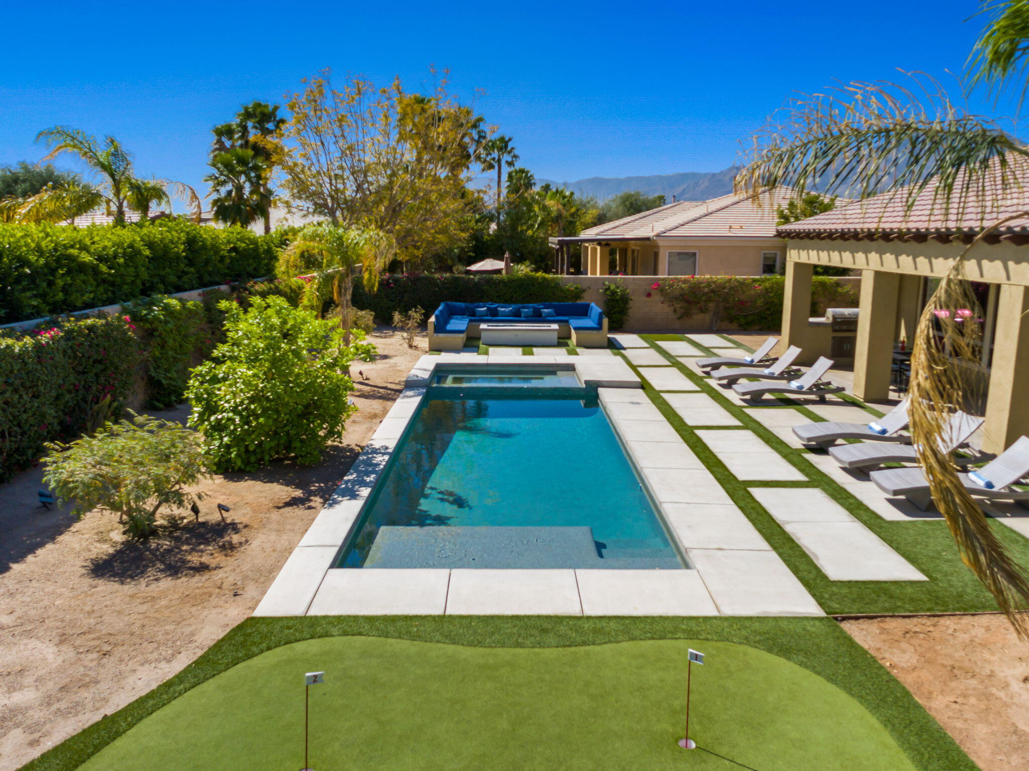 48640 Cascade Street Indio, CA 92201 - Photo 48 of 49 a view of swimming pool with outdoor seating and a patio