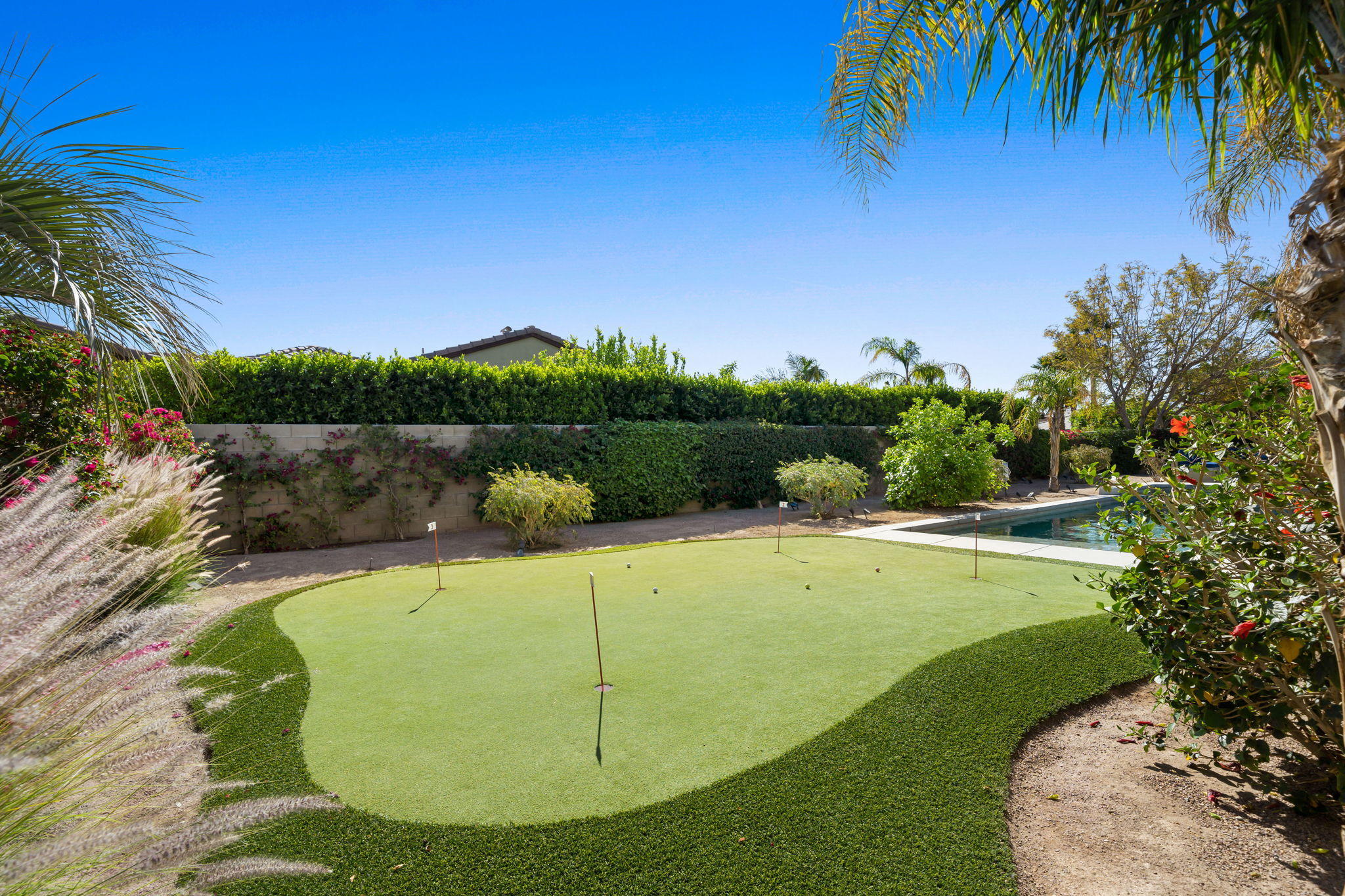48640 Cascade Street Indio, CA 92201 - Photo 10 of 49 a view of a swimming pool with a yard