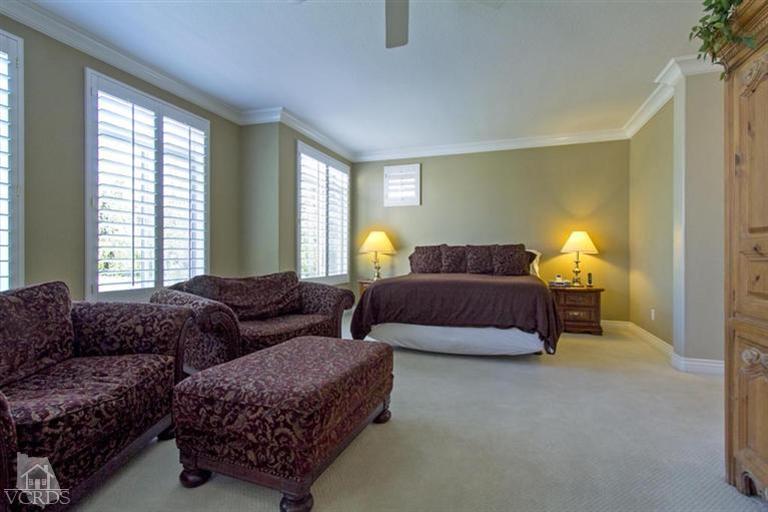 11210 Bentcreek Road Moorpark, CA 93021 - Photo 14 of 22 a bedroom with bed couch and window