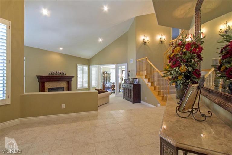 11210 Bentcreek Road Moorpark, CA 93021 - Photo 3 of 22 a view of a livingroom with furniture and a chandelier