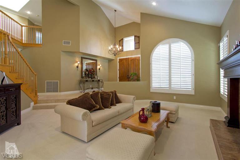 11210 Bentcreek Road Moorpark, CA 93021 - Photo 5 of 22 a living room with furniture and a flat screen tv
