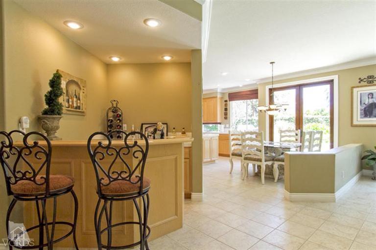 11210 Bentcreek Road Moorpark, CA 93021 - Photo 10 of 22 a dining room with furniture and a floor to ceiling window