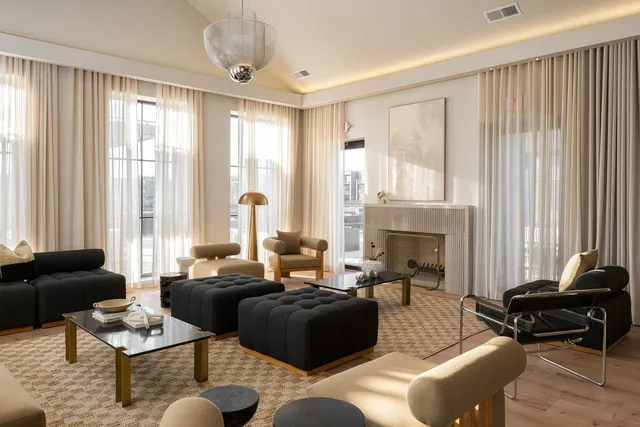 a living room with furniture or couch and a large window