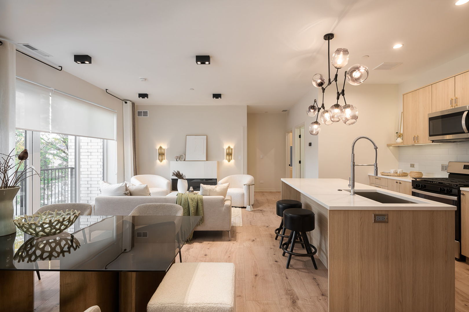 8015 West Belmont Avenue, Unit 104 River Grove, IL 60171 - Photo 3 of 35 a living room with furniture kitchen view and large windows