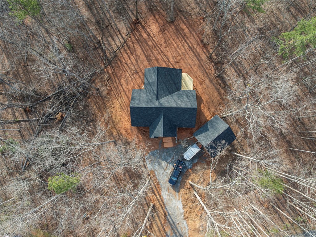 110 Gabriel Way Pickens, SC 29671 - Photo 4 of 12 Perched among the trees, this unique property offers serene views and a sense of peaceful seclusion.